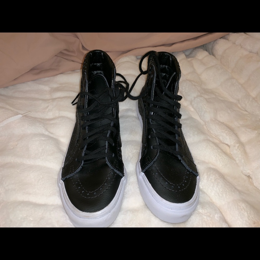 Black leather high top vans